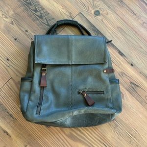 Olive green medium sized leather backpack. Only used once. In perfect condition.